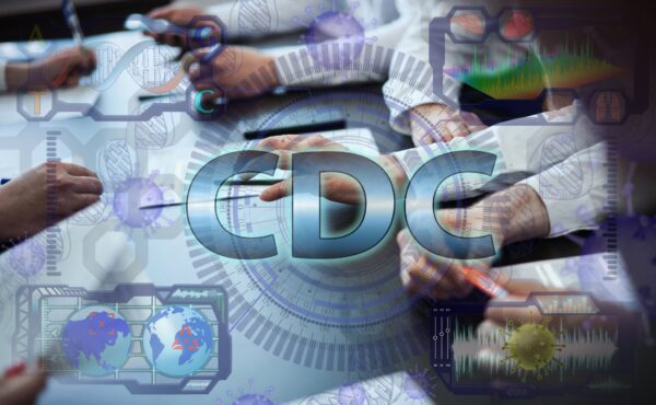 CDC logo over medical background.